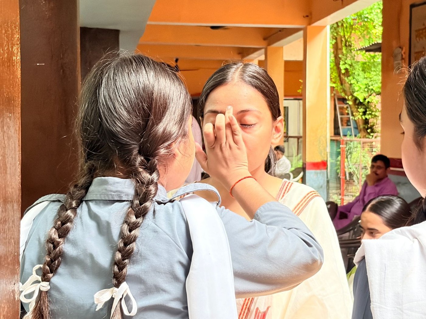 Teachers’ Day Celebration 2026 – blessing a student
